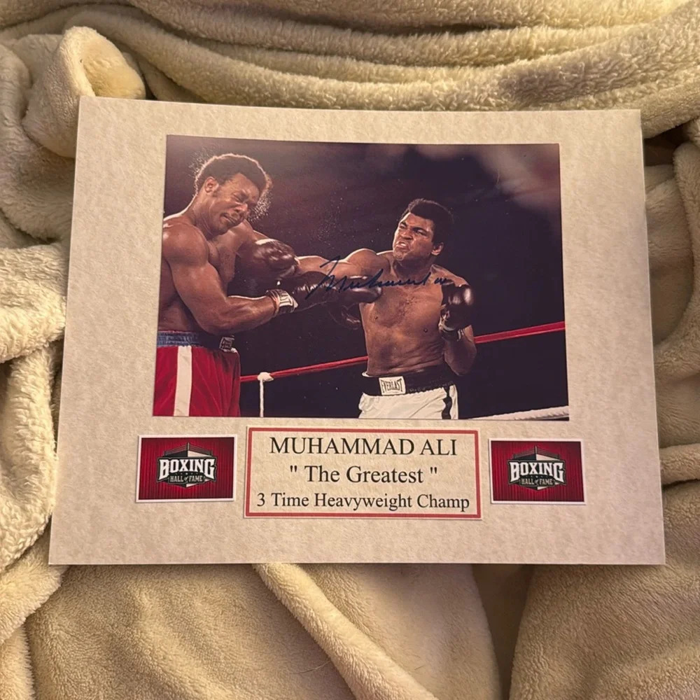 - Muhammad Ali autographed photo